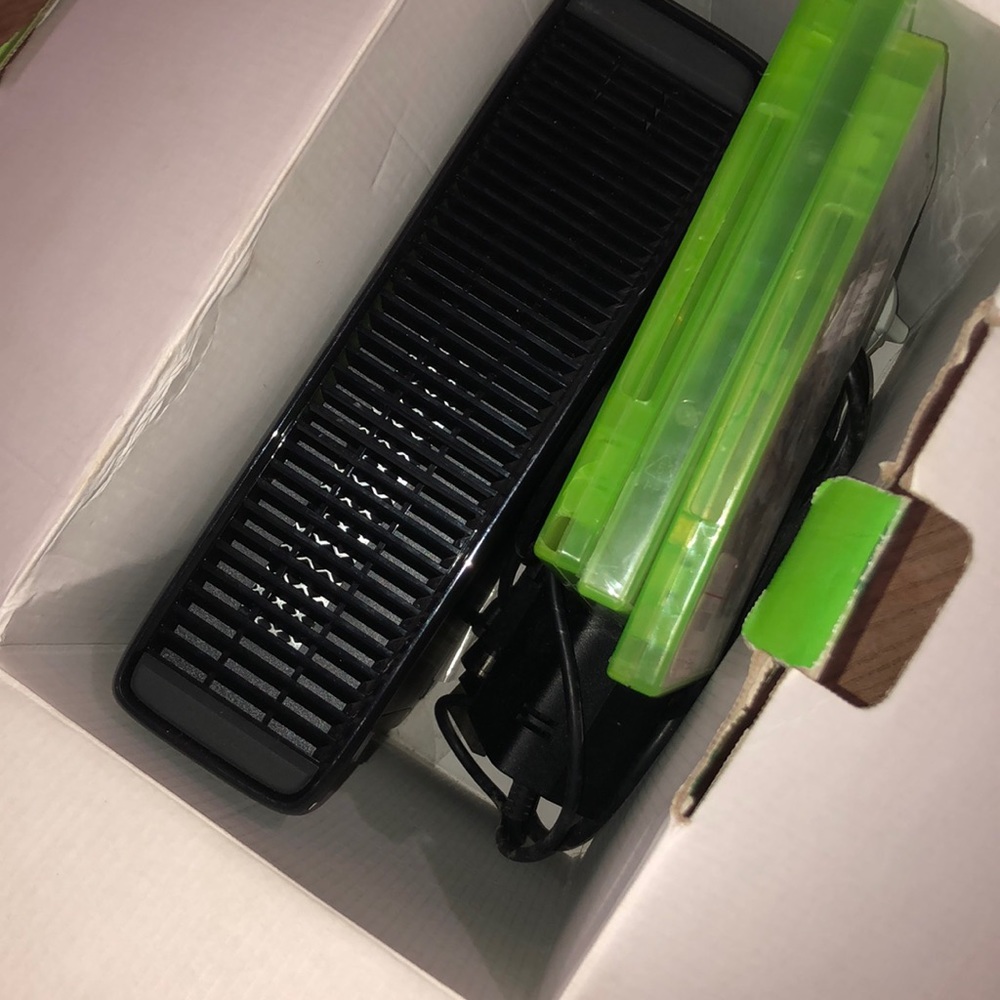 Xbox 360 console with 3 games and 1 controller